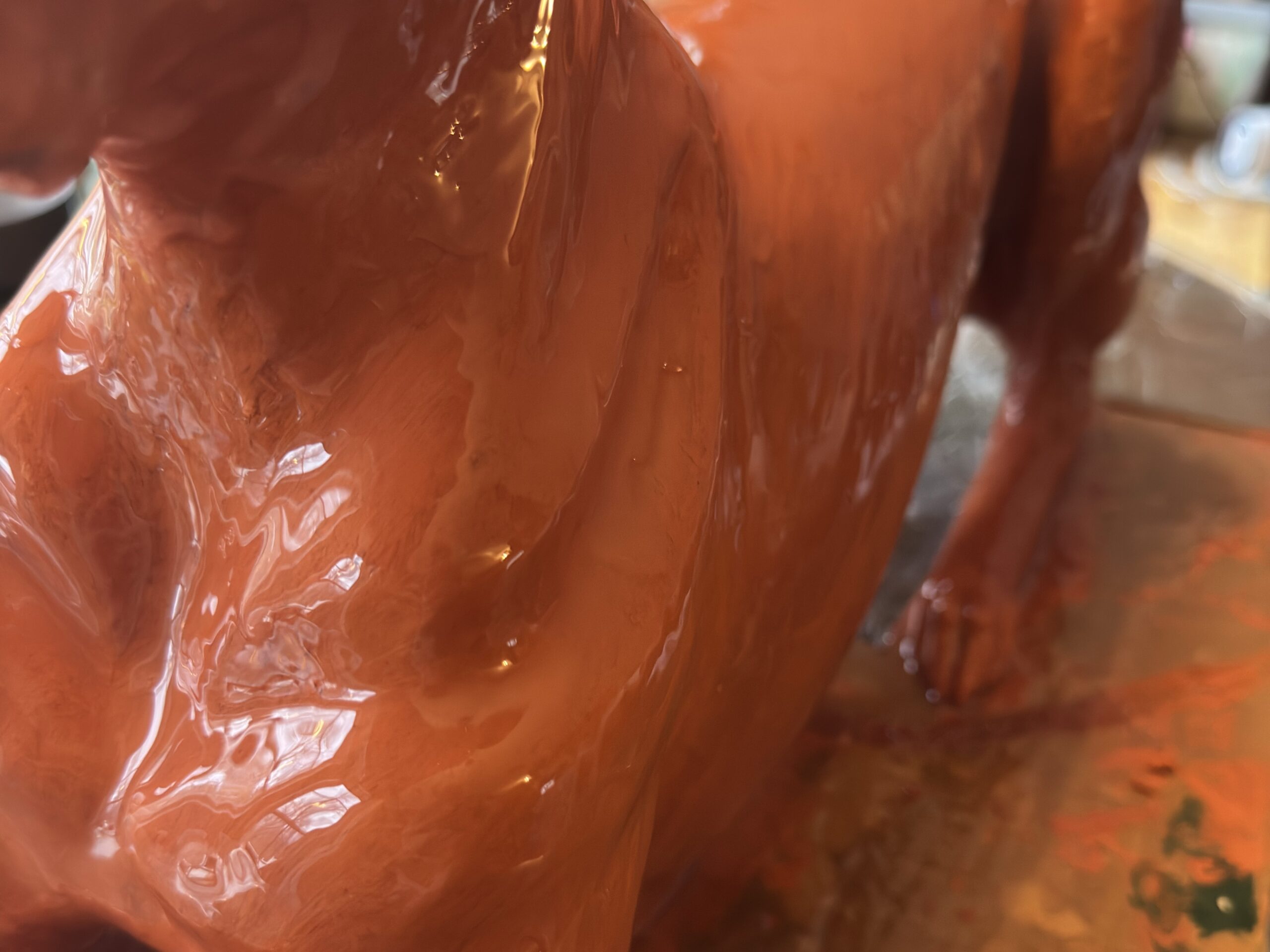 Silicone going onto the sculpt